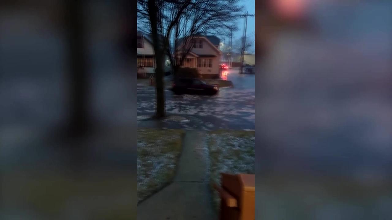 Street turns to river as flooding hits Wisconsin