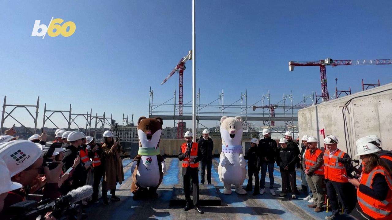Mascots Visit Construction Site of Future Olympic Village in Milan