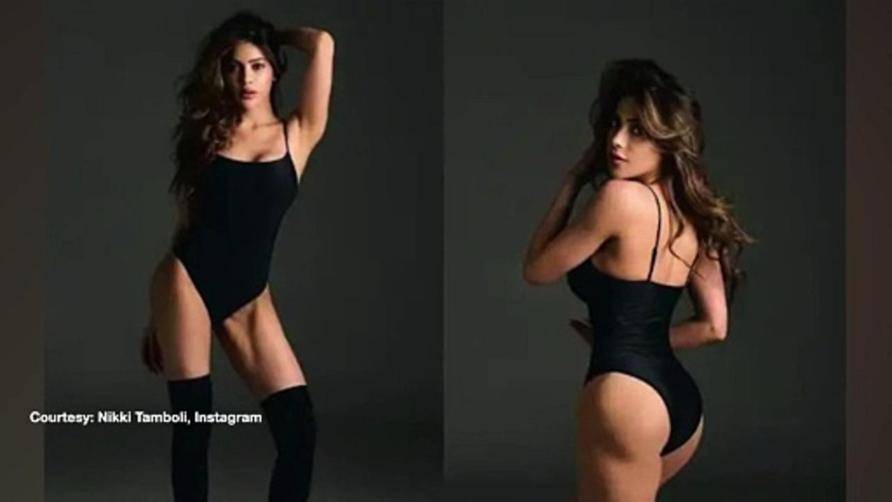 Viral: Nikki Tamboli raises Hotness Quotient in black Bodysuit, Thigh-High boots!