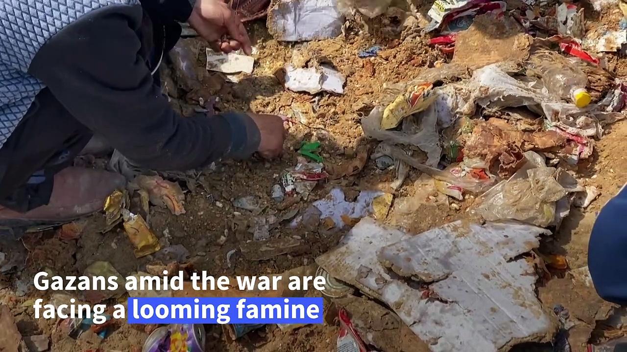 Gaza City residents collect remnants of airdropped aid