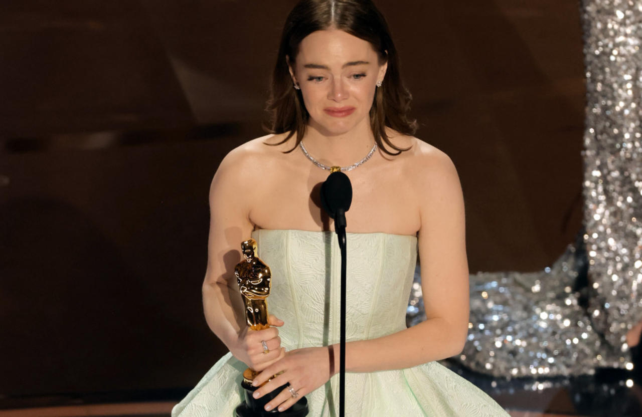 Oscar-winning actress Emma Stone had to be 'sewn back into' gown after she broke it dancing to 'I'm Just Ken'