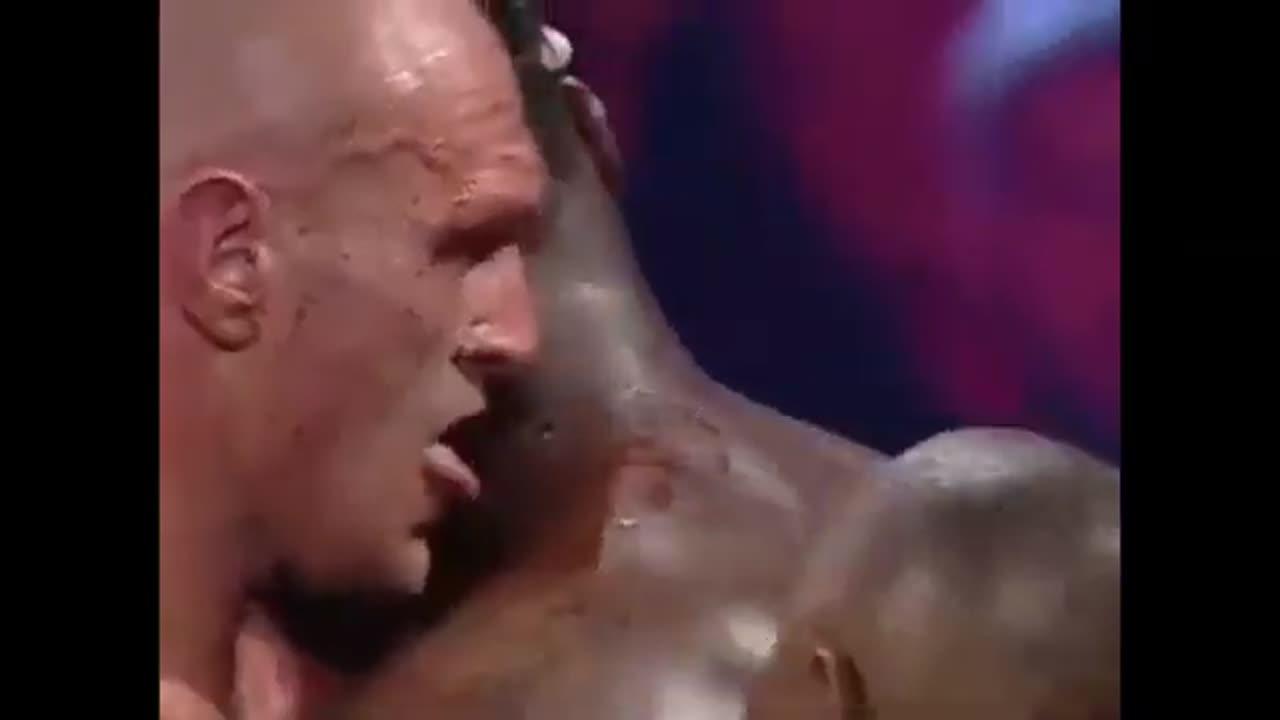 What is Tyson Fury doing ? Looks like he's tasting Wilders blood! 🦎