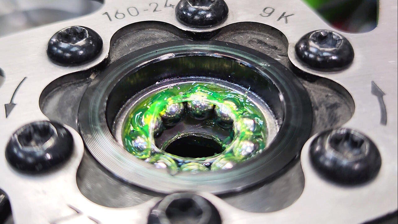 Maintenance of the bicycle hub by the mechanic. One News Page VIDEO