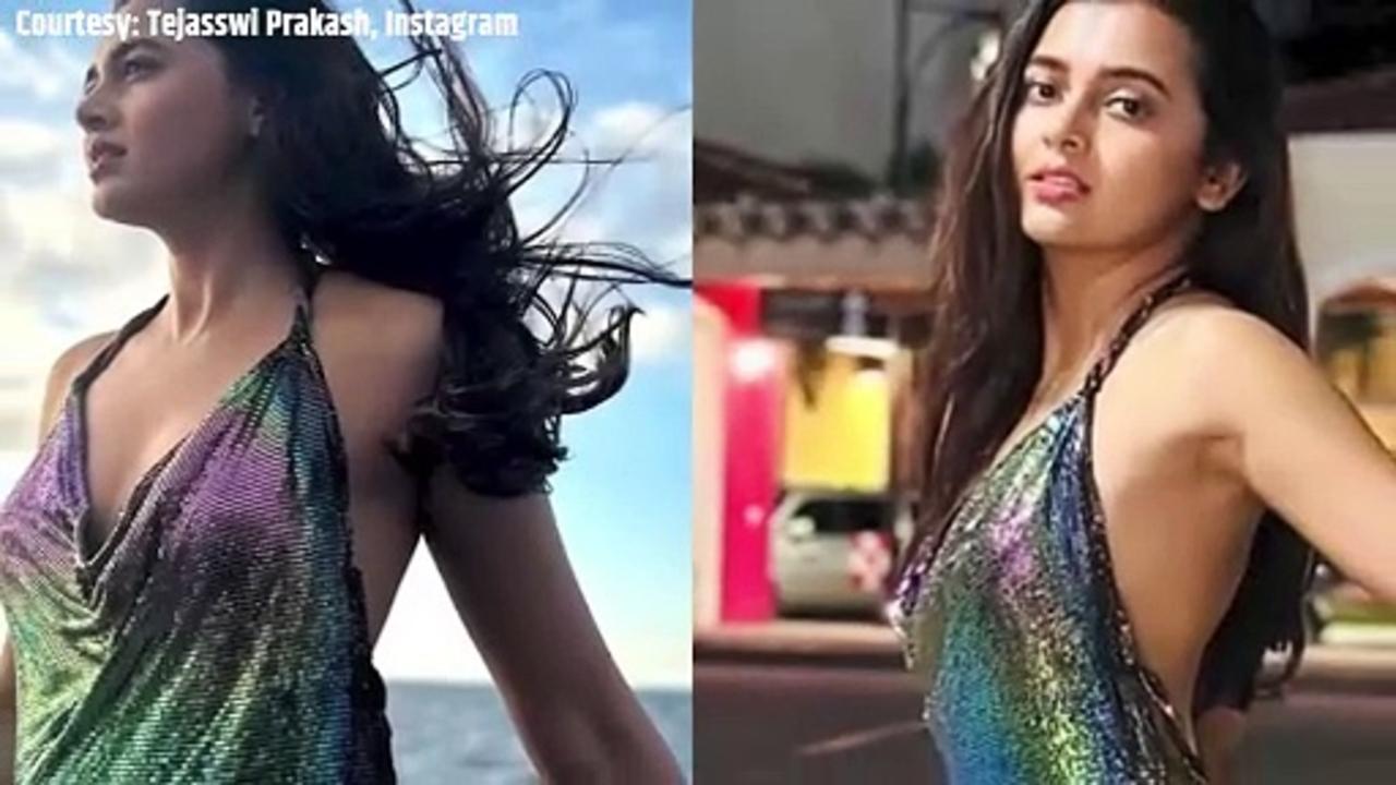 Tejasswi Prakash serves party-ready perfection in mini-dress with deep cowl neckline and slits!