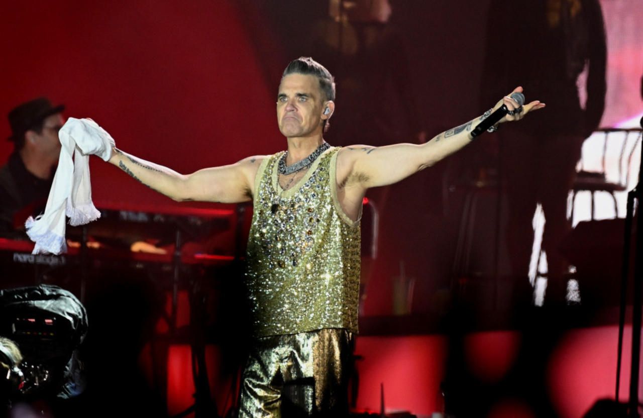 Robbie Williams wasn't convinced by 'Rock DJ' because he thought the single was 'cheesy as hell'