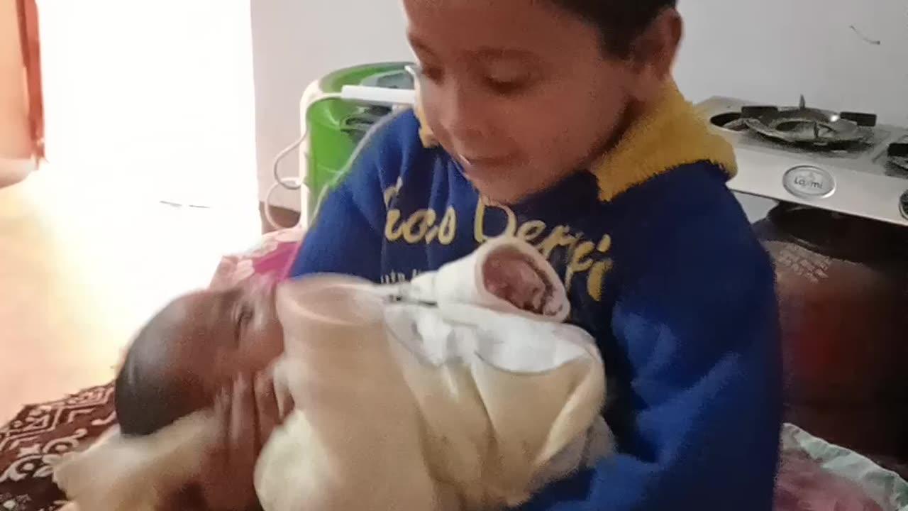 Big brother taking care of smalll brother