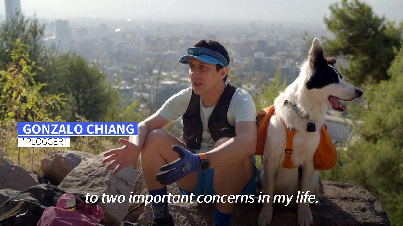 In Chile, a lawyer and his dog 'plog' to raise recycling awareness