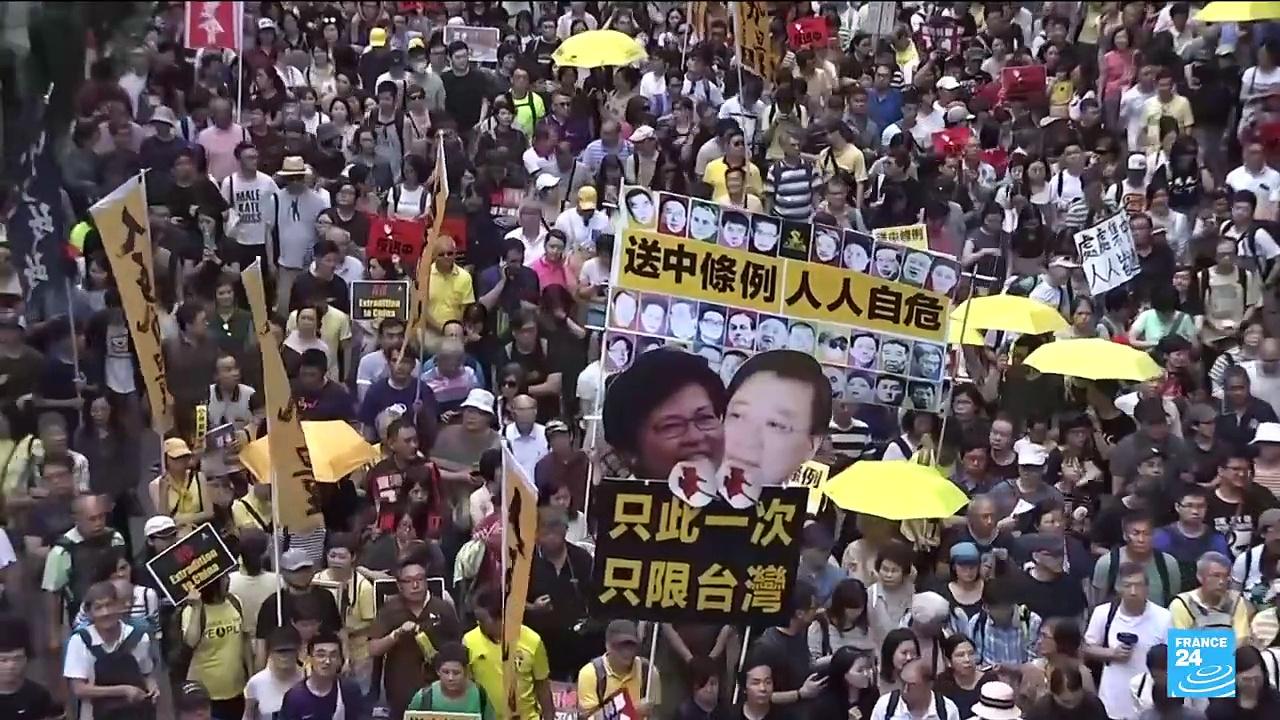 Hong Kong adopts contentious law giving government more power to quash dissent