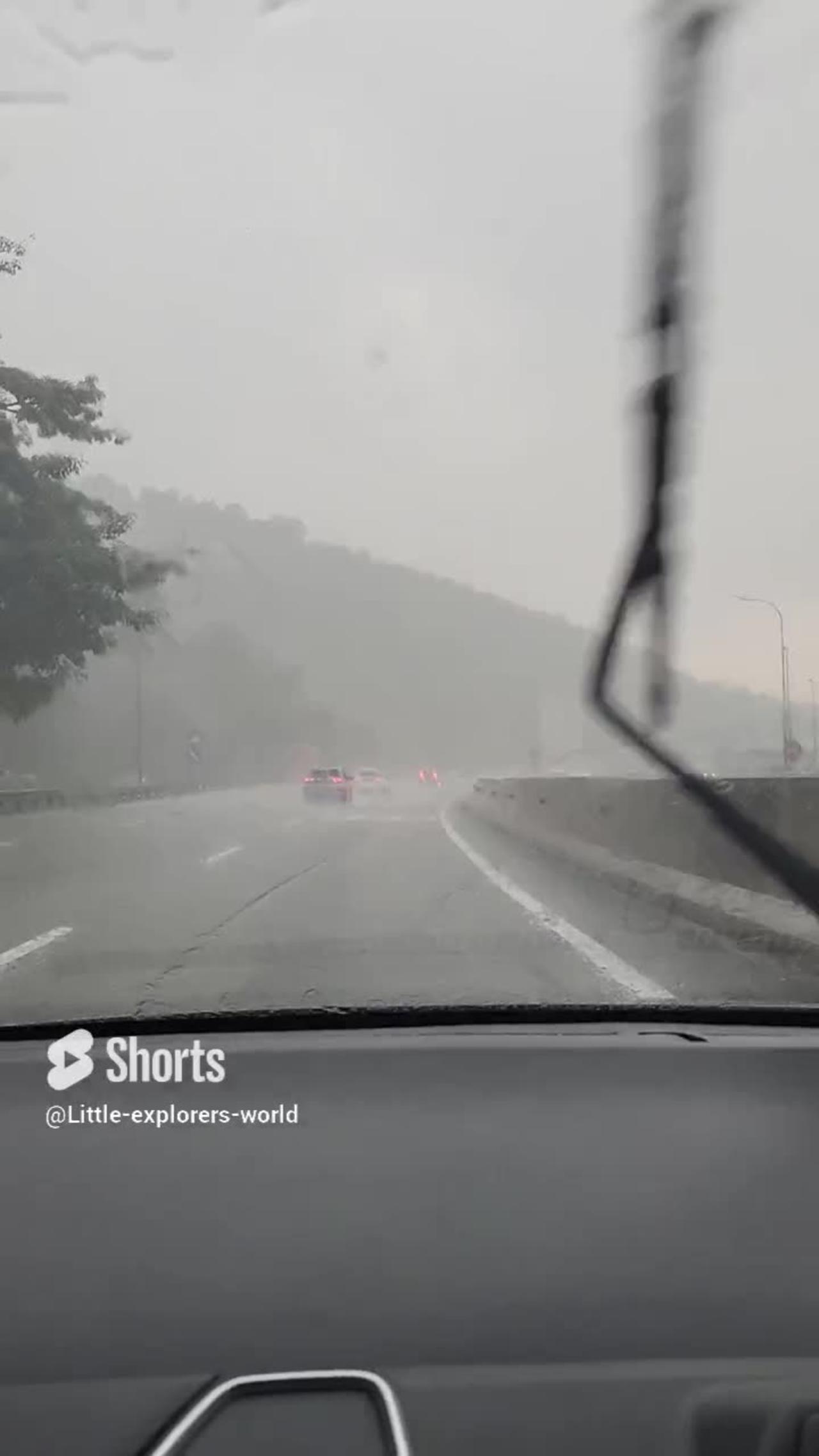 Slightly Challenging Driving Conditions in Malaysia Downpour