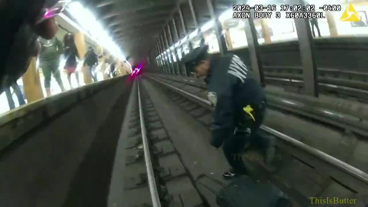 Bodycam video shows NYPD officers rescue unconscious man who fell onto subway tracks in Brooklyn