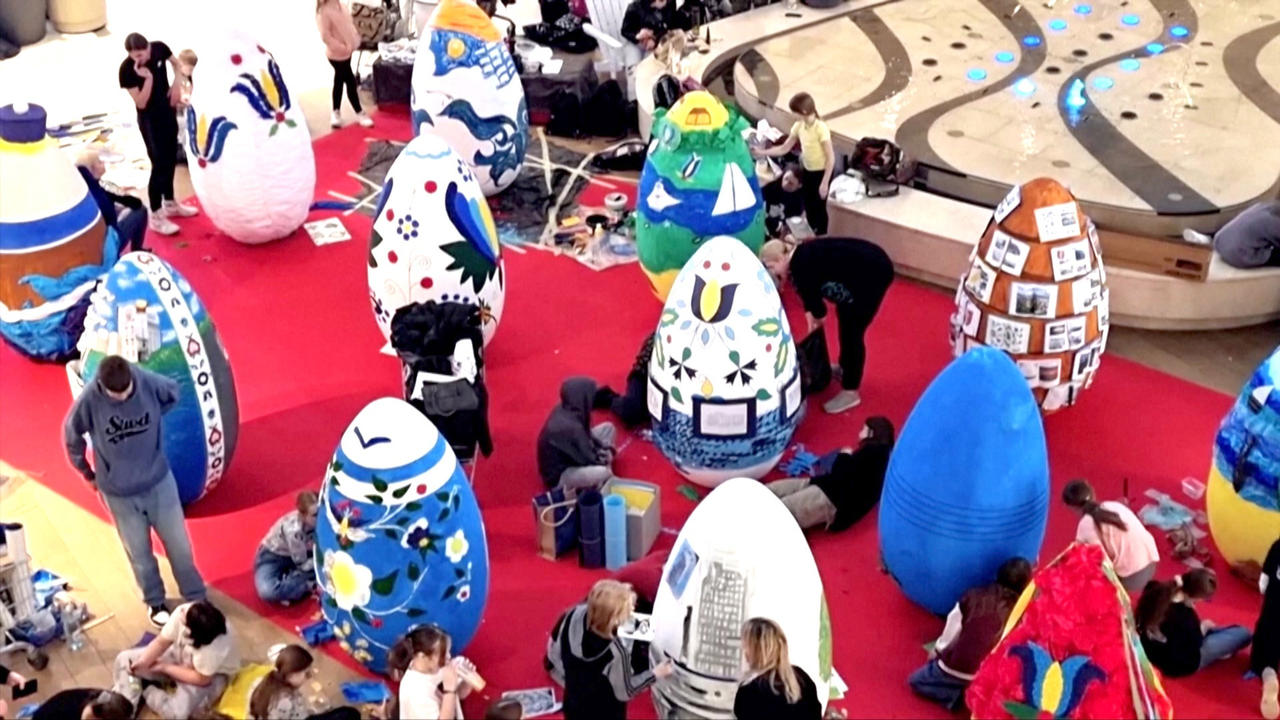 Polish Kids Decorate Giant Eggs with Local Color and Traditions