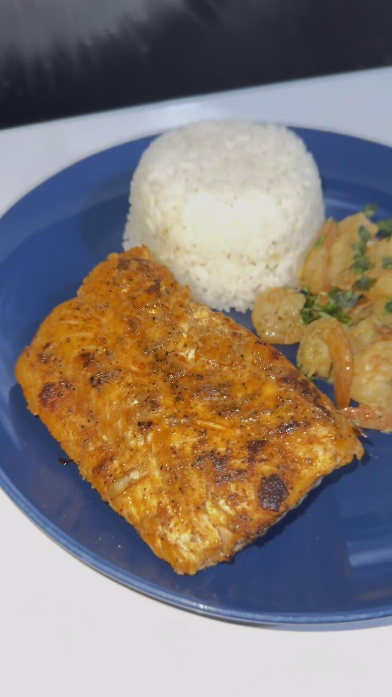 cooking salmon with shrimp and rice