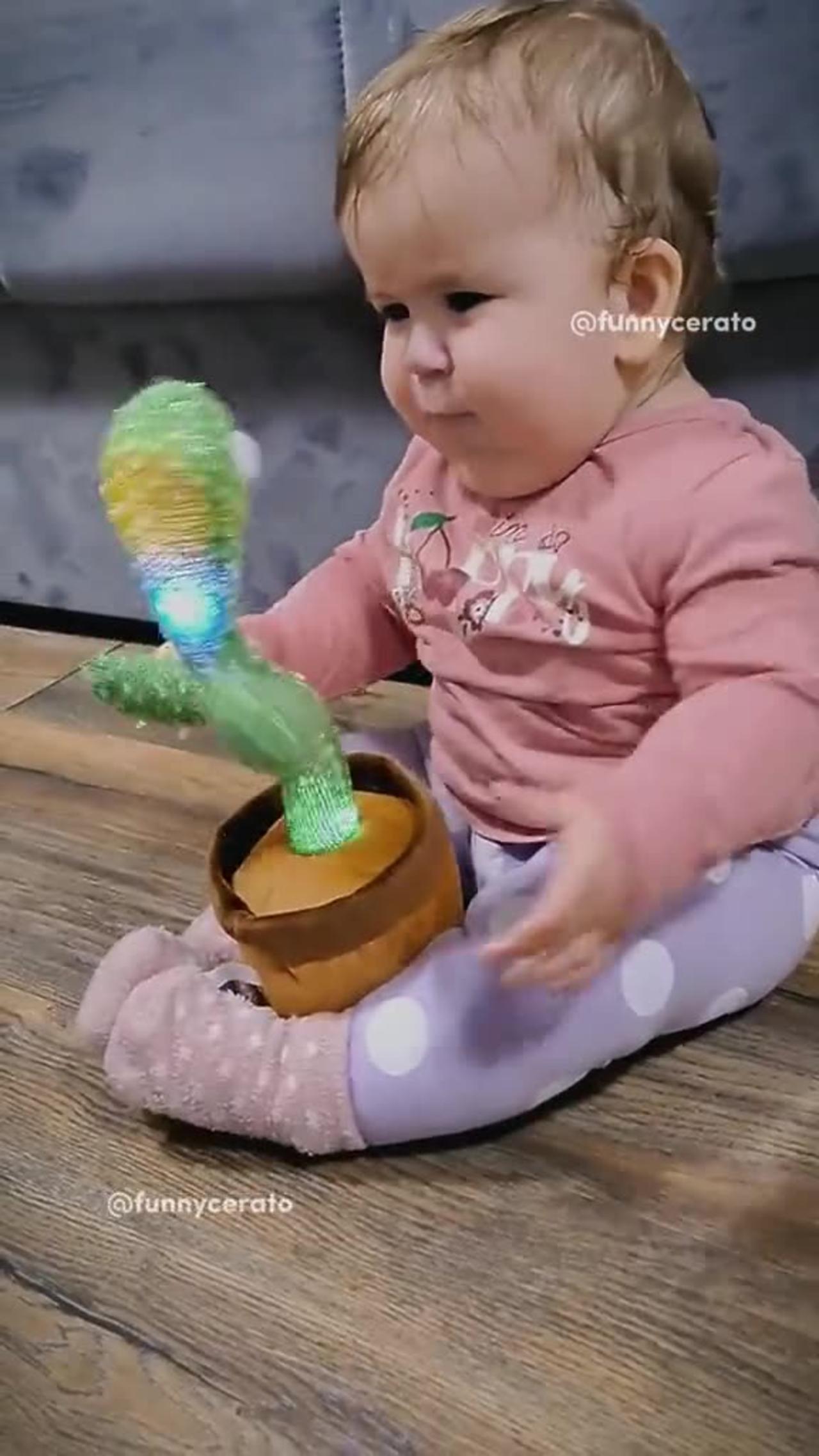 Baby with cactus toys