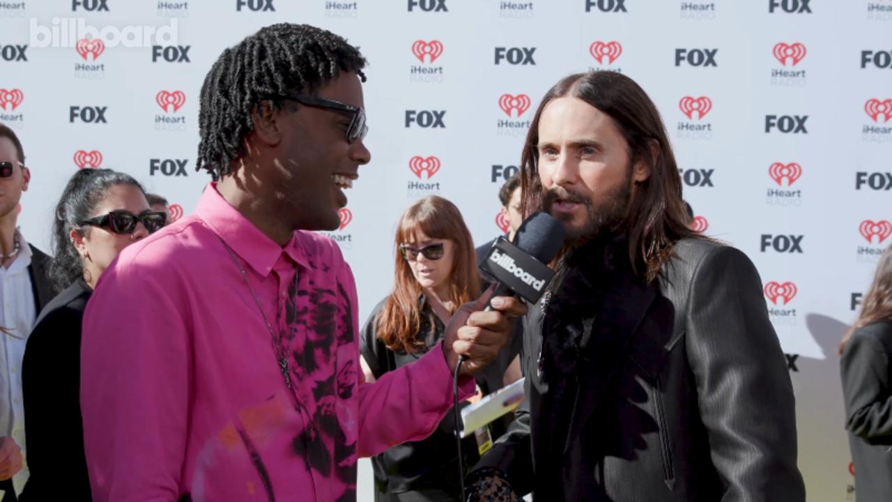 Jared Leto Talks Climbing The Empire State Building, Filming 'Tron: Ares' & More | iHeart Radio Music Awards 2024