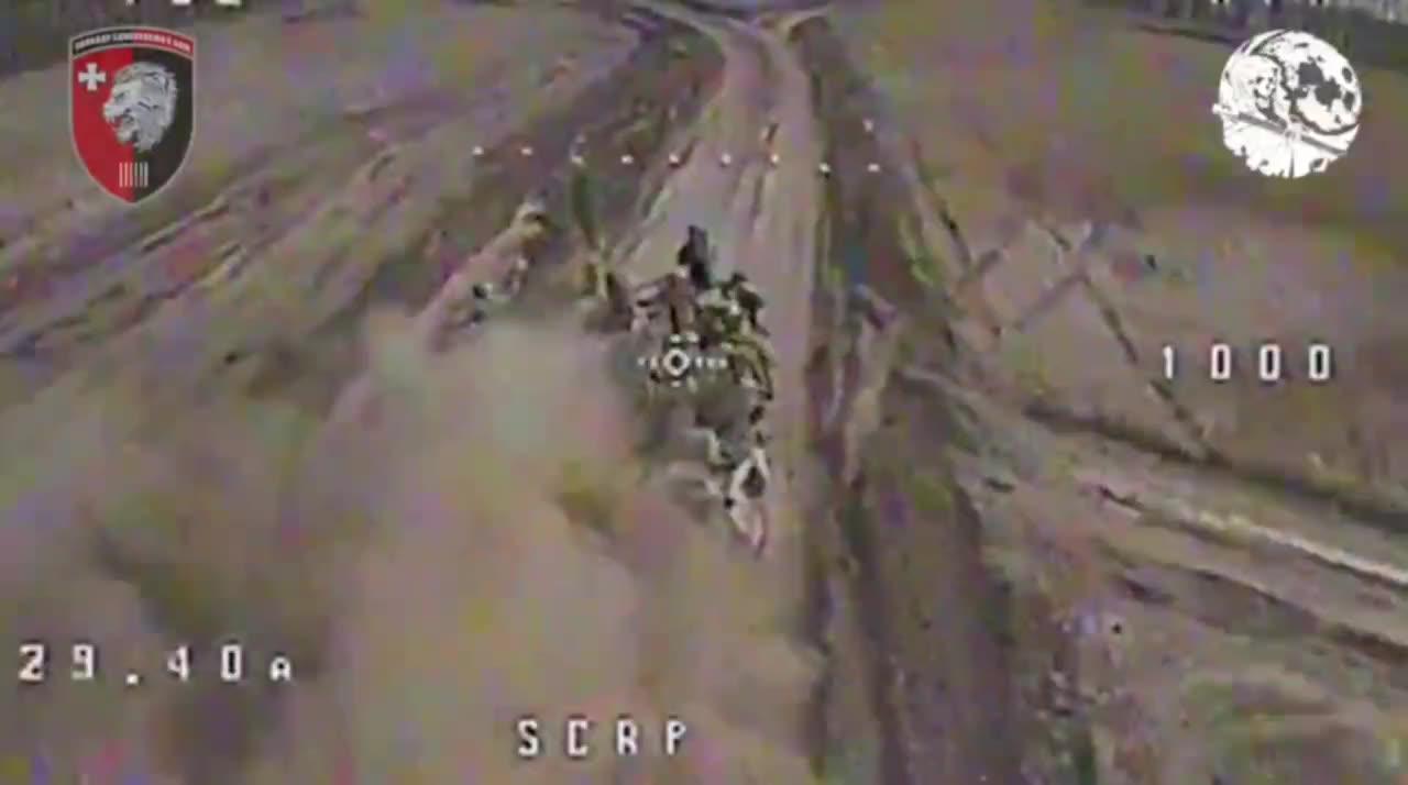 Ukrainian Drone Runs Down an Overloaded Russian APC