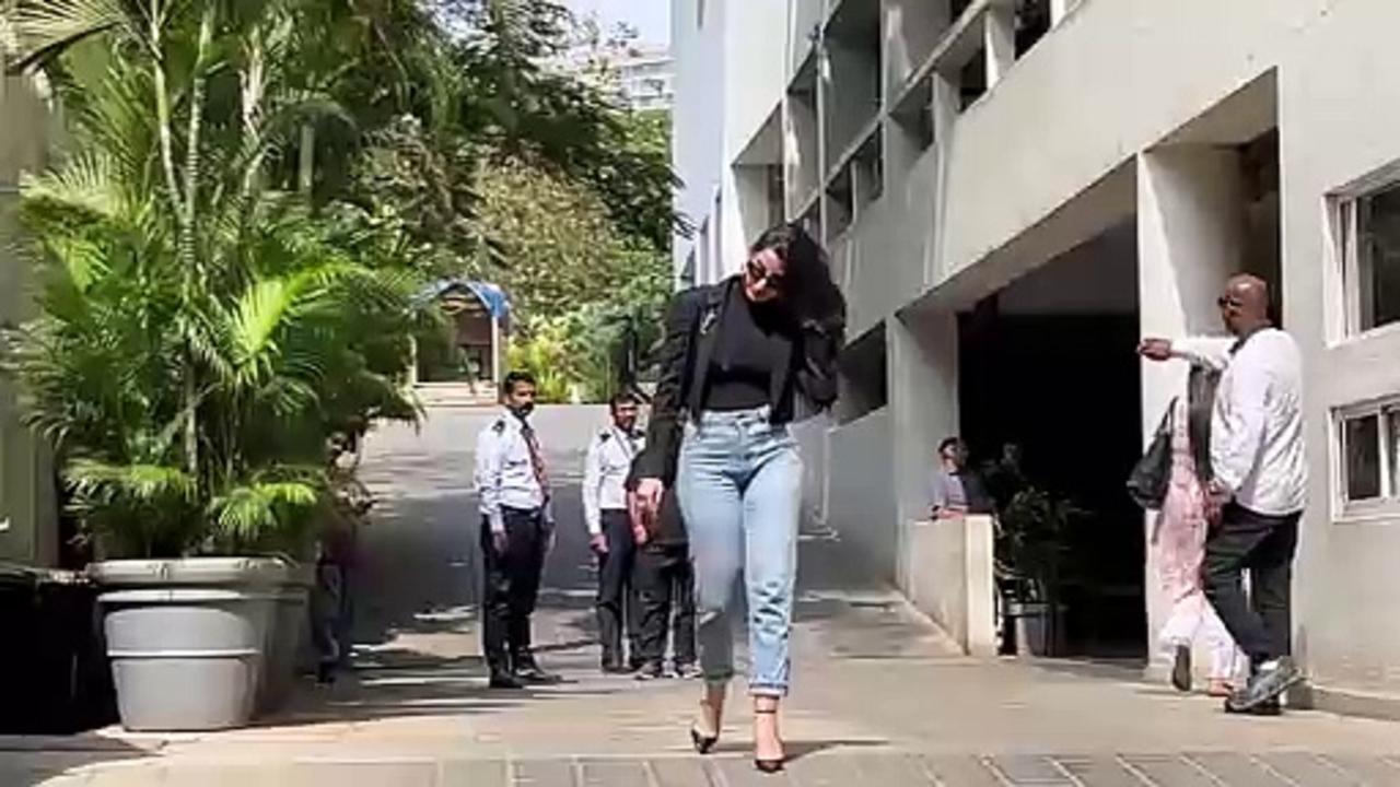 Nora Fatehi gives the Power Dressing Game a laid-back Twist in YSL cropped Blazer with rolled Jeans