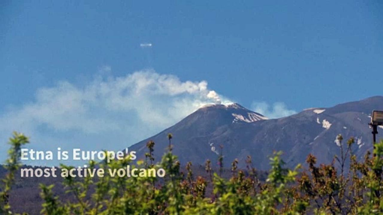 Rare smoke rings rise from Italy's Mount Etna