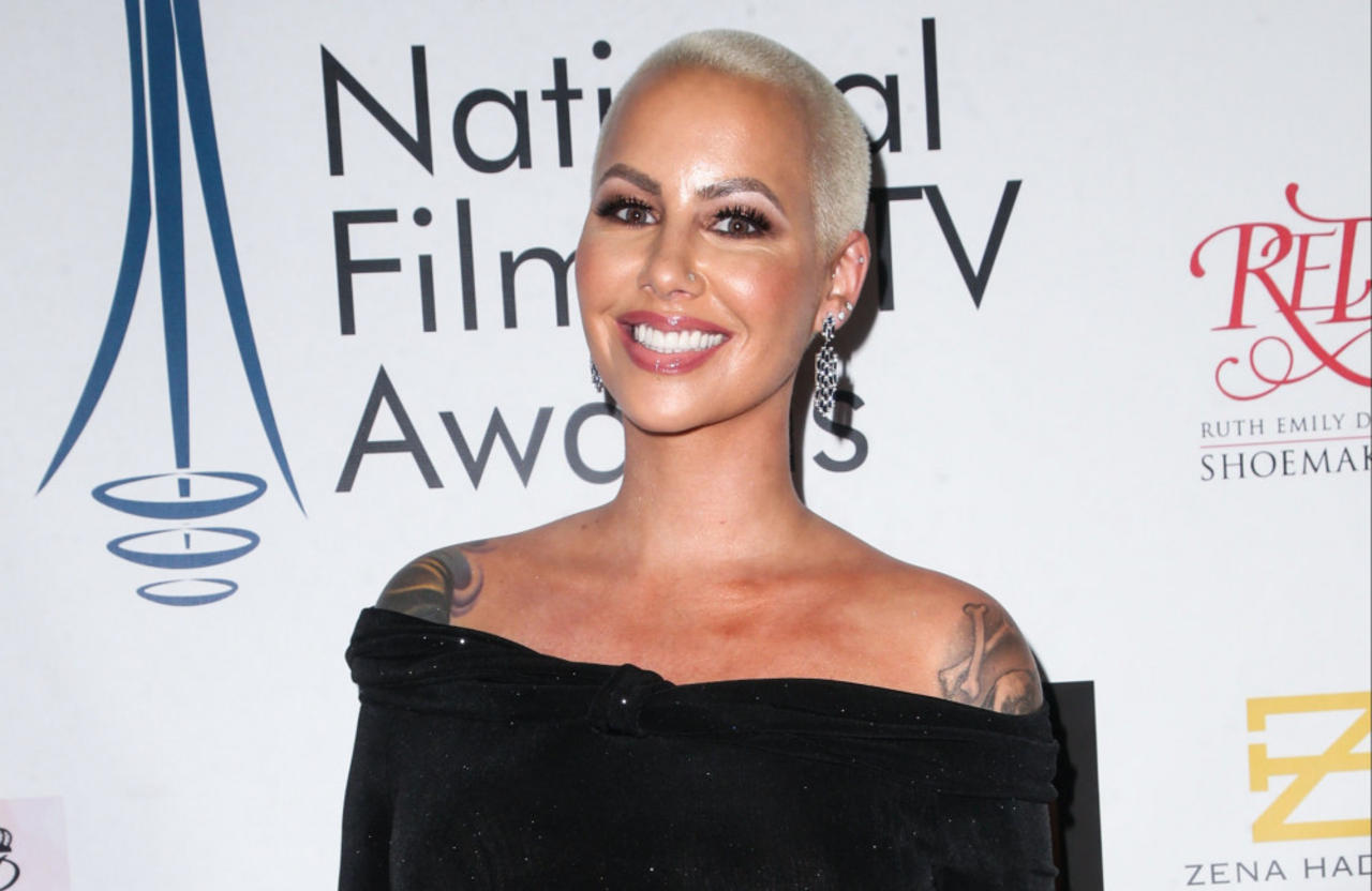Amber Rose clarifies that she and Chris Rock are just 'good friends' following dating speculation