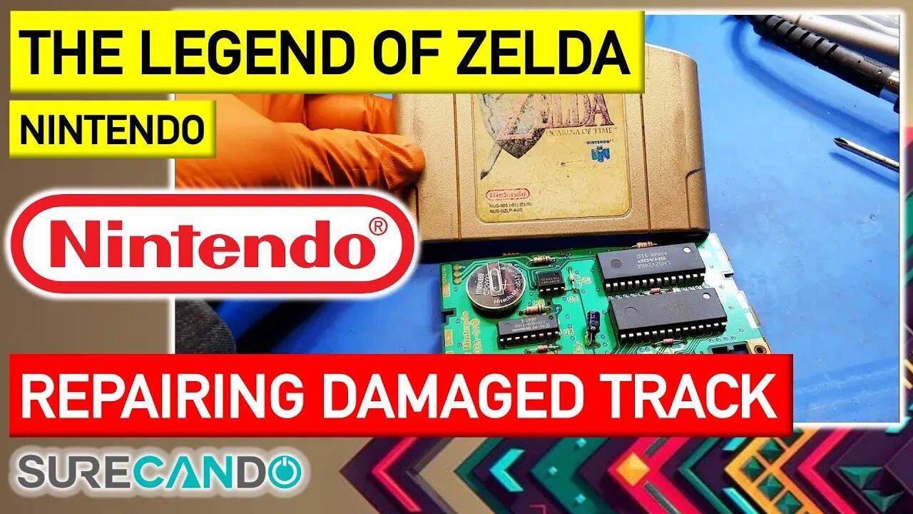 Repairing an damaged track on Nintendo 64 Game Pak The Legend of Zelda Ocarina of Time from 1996