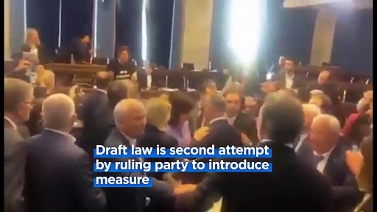Mass brawl breaks out in Georgian parliament over controversial media law