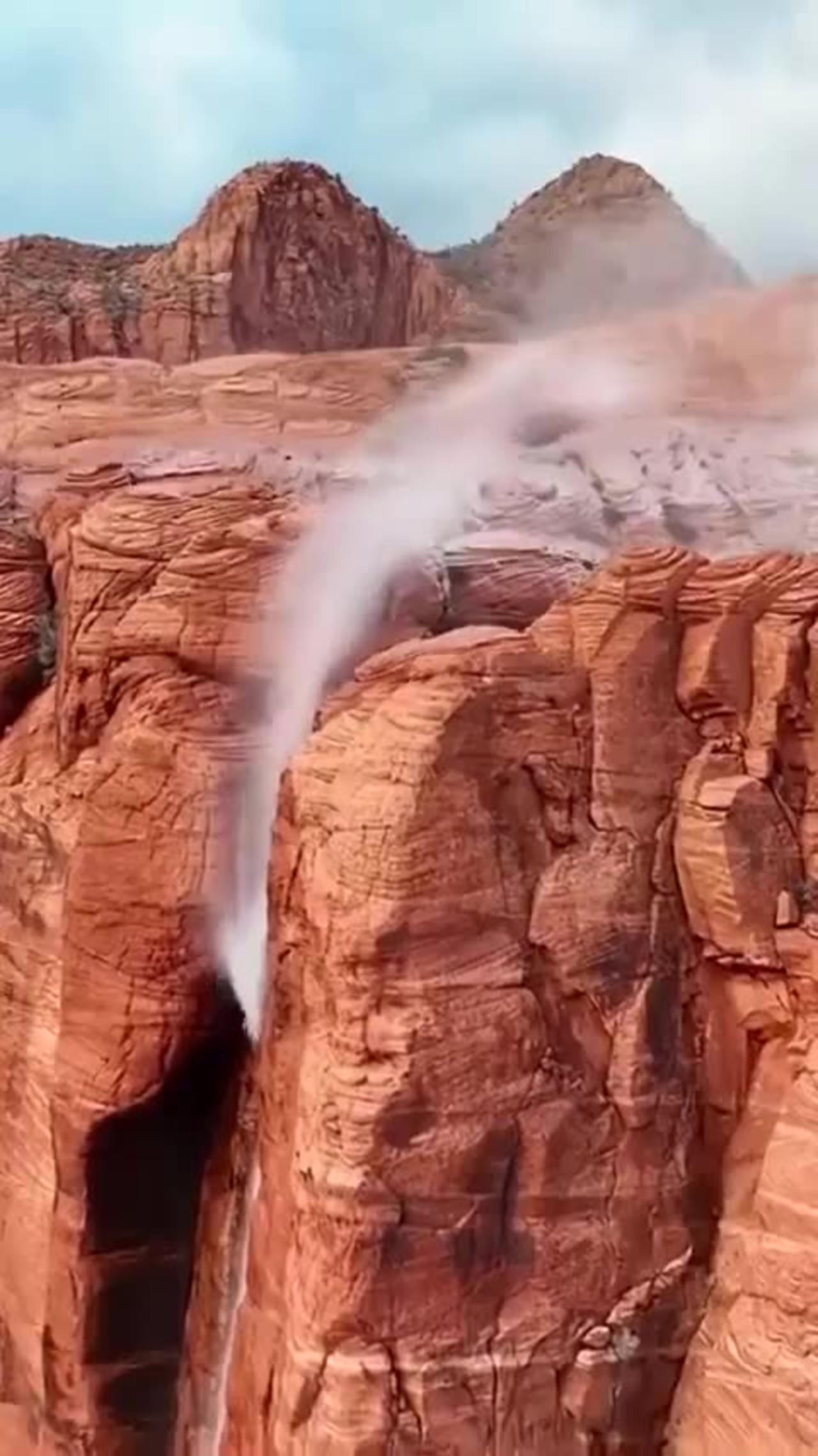 Waterfall flows backwards, due to high winds in Utah