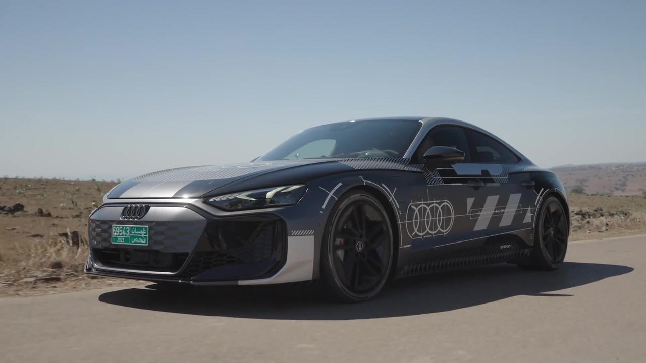 The new Audi e-tron GT prototype black camouflage wrap Driving Video