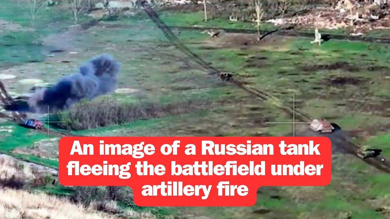 An image of a Russian tank fleeing the battlefield under artillery fire