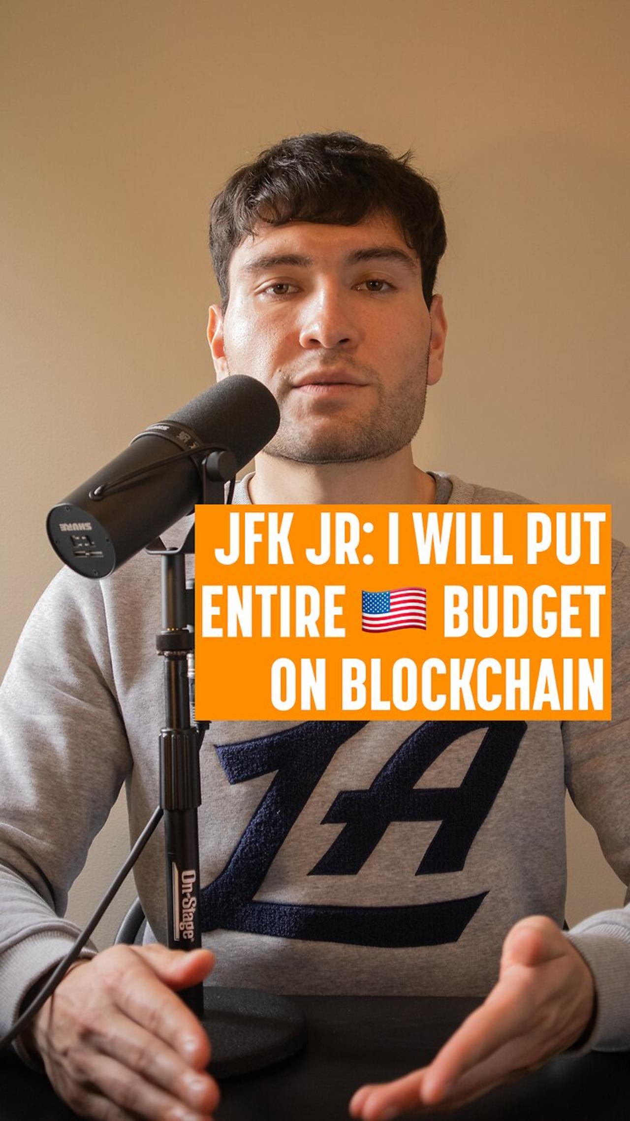 John F. Kennedy Jr. promises to put "entire US budget" on blockchain, if elected.