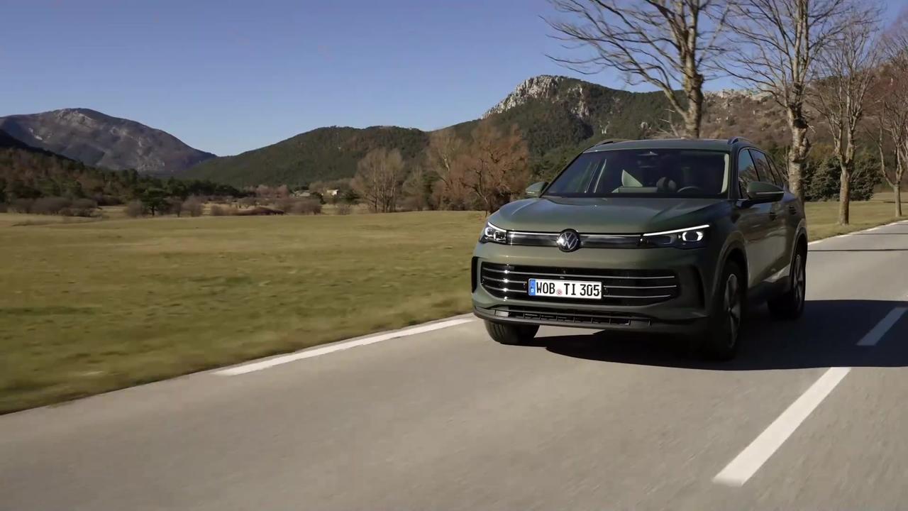 The all-new Volkswagen Tiguan in Cipressino Green Driving Video
