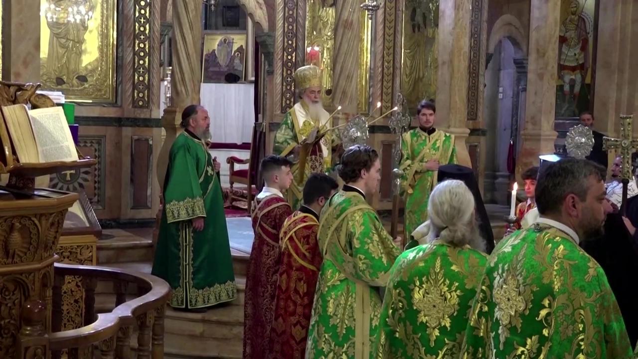 Greek Orthodox patriarch leads Palm Sunday procession in Jerusalem
