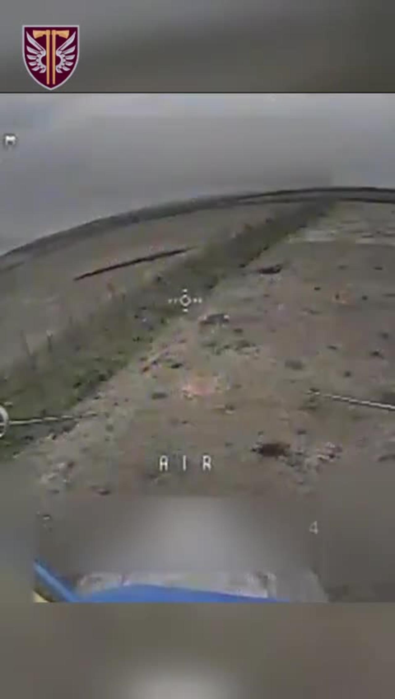 Overloaded Russian APC Hit by a Drone