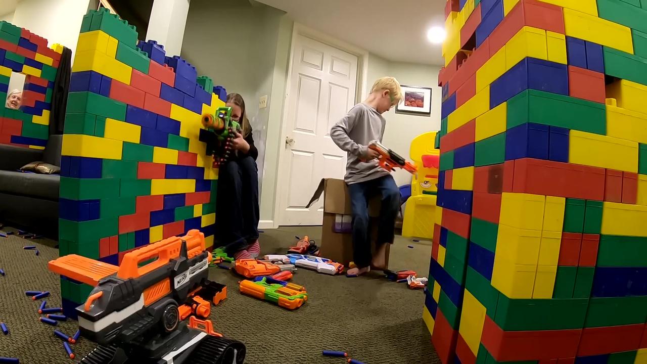 LEGO FORT Nerf War!!! 400 lbs of Legos, 60 Guns & 4000 Nerf Darts