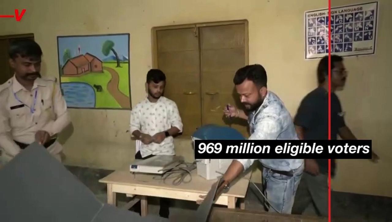 Watch Indian Poll Workers Lug Voting Materials Uphill on Foot