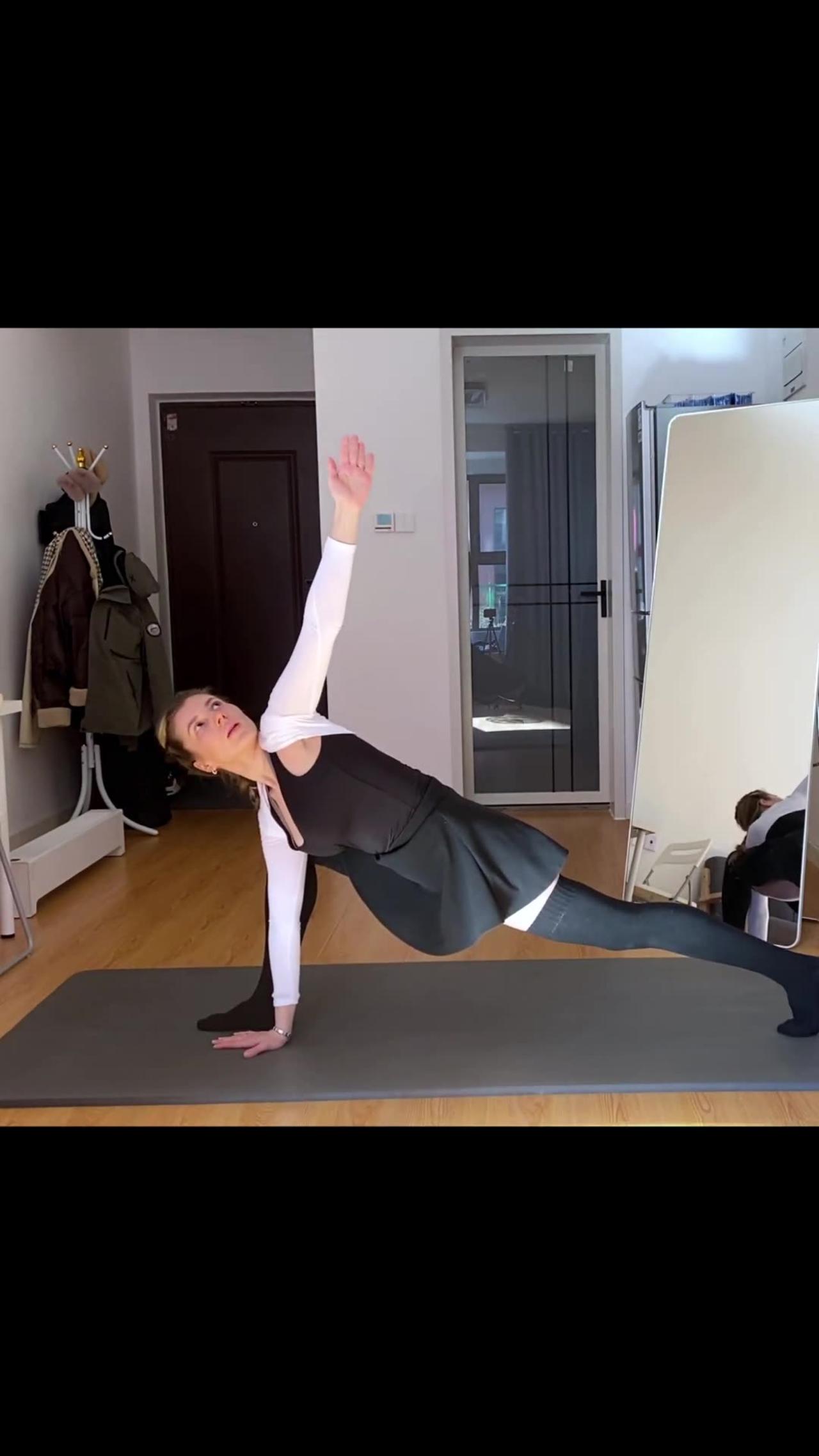 Yoga at home in a skirt