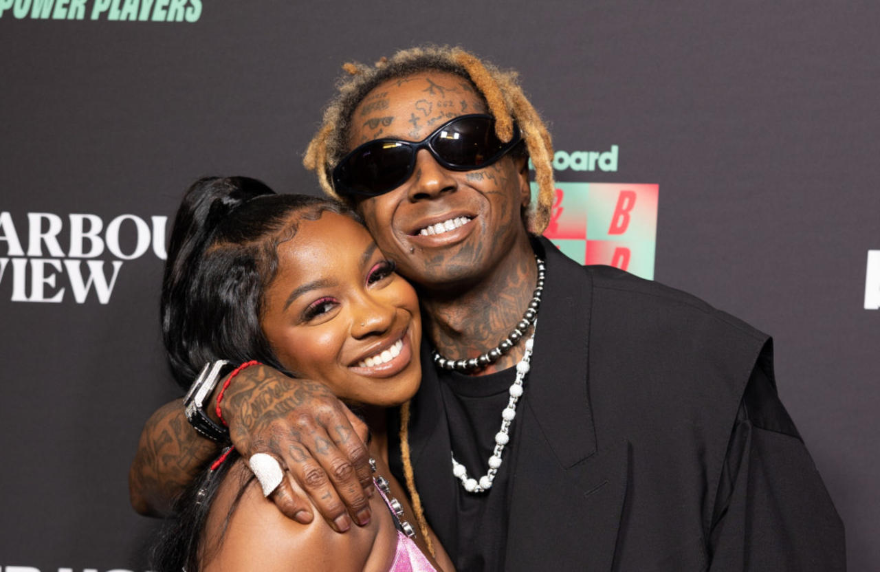 Reginae Carter has learned to be 'super private' from her dad
