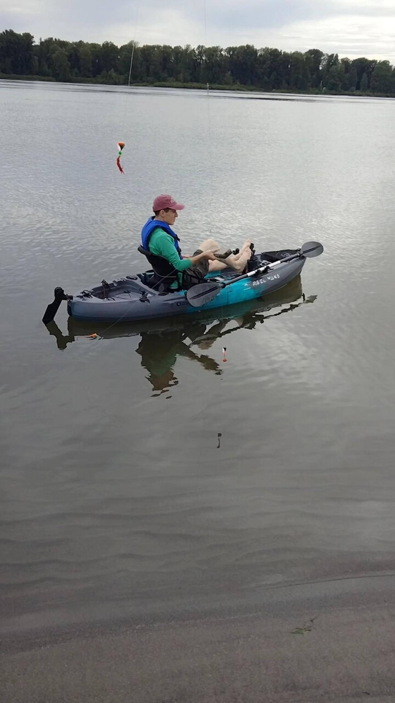 Dropping baits in a kayak