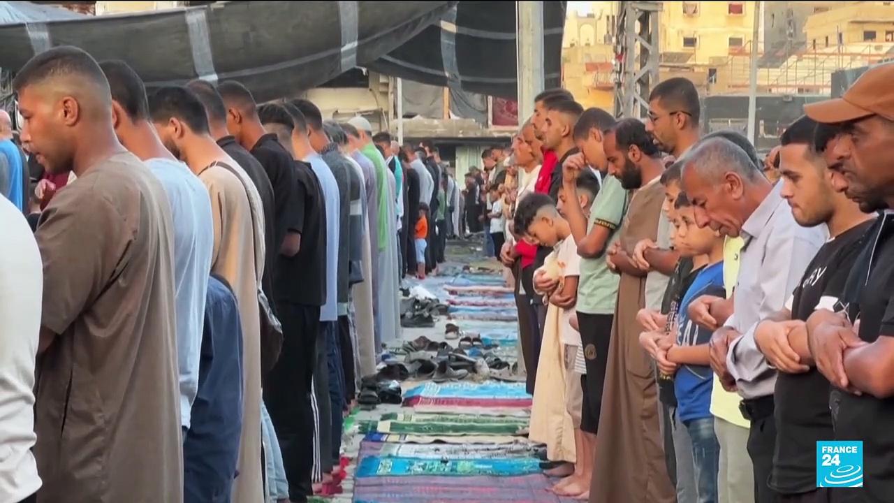 Gazans perform prayers on first day of sombre Eid - newsR VIDEO