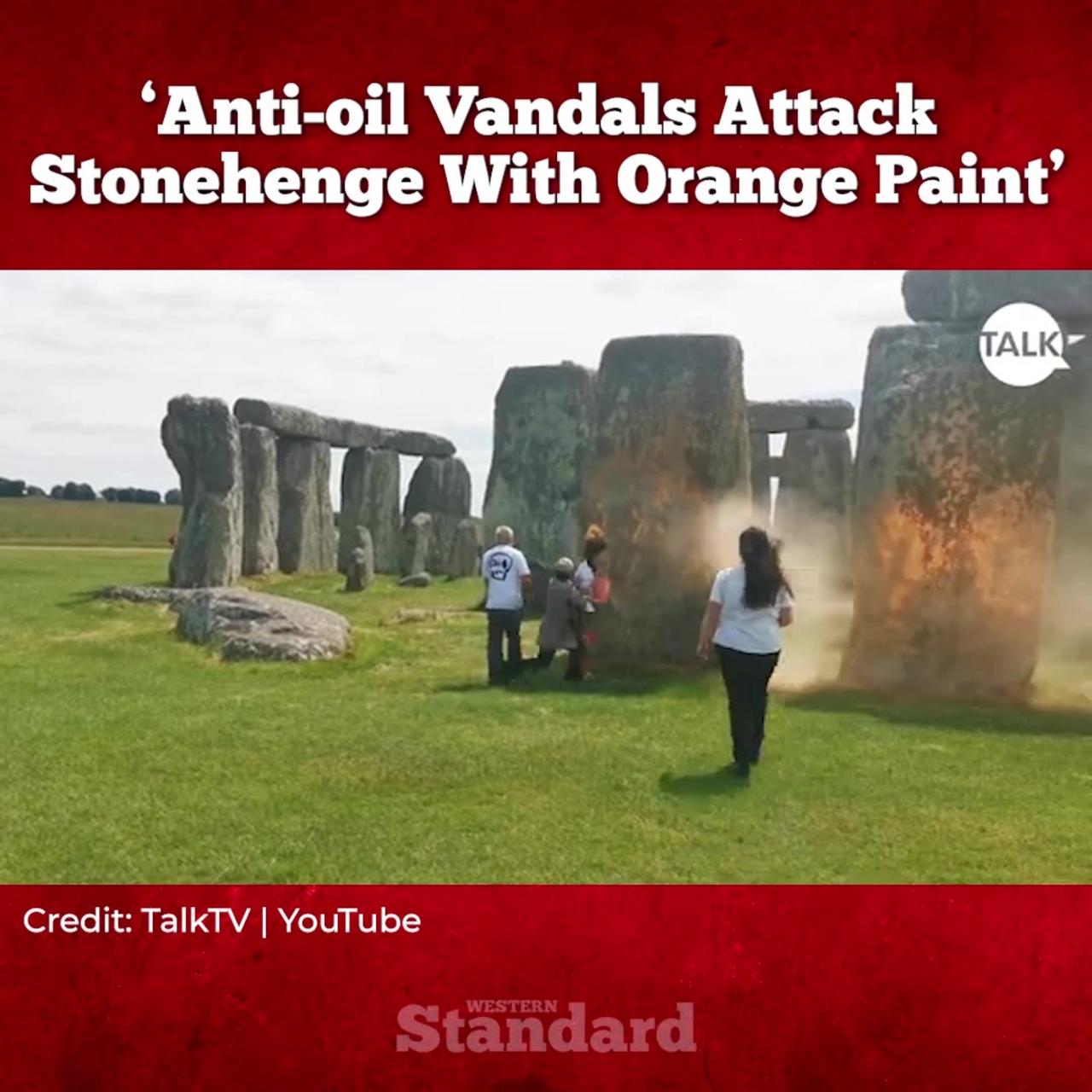 Anti-oil activists douse Stonehenge with orange paint ahead of summer solstice