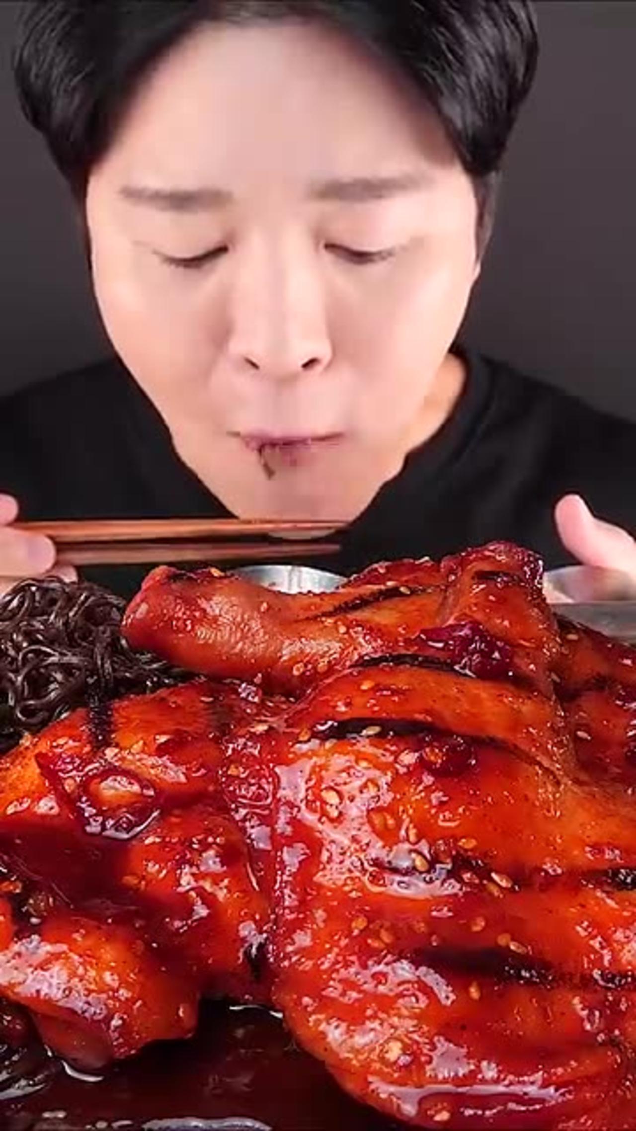 Eating spicy barbecue chicken