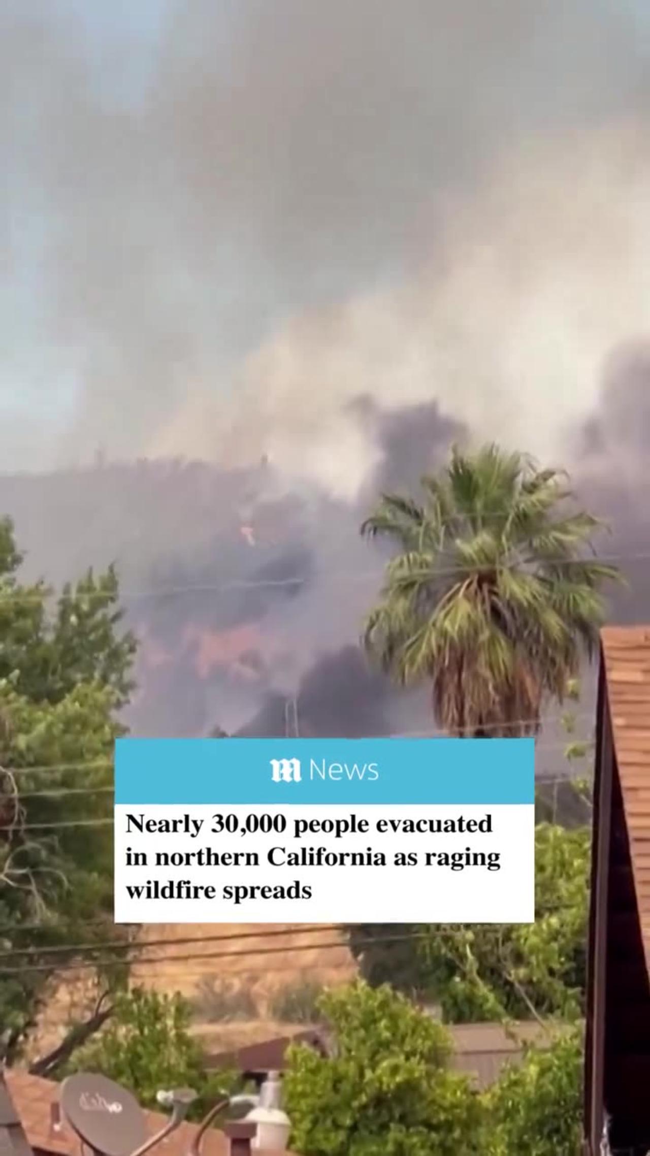 BREAKING: Nearly 30,000 people evacuated in northern California as raging wildfire spreads.