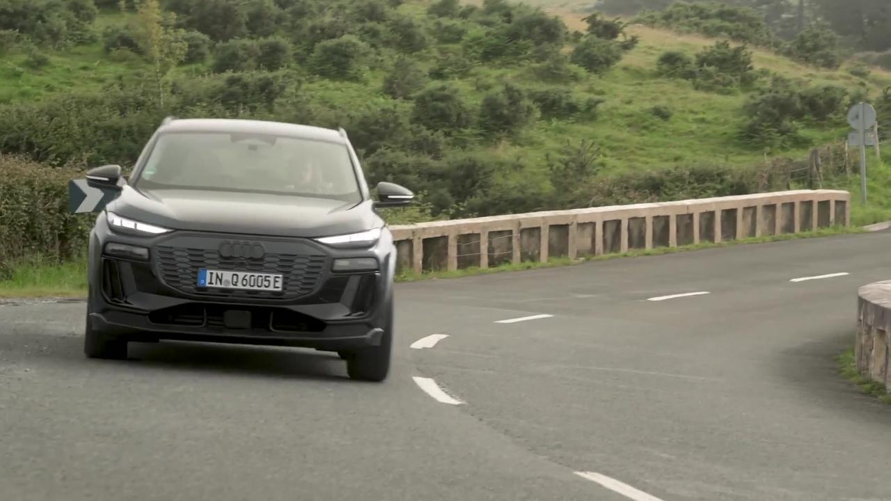 The new Audi Q6 e-tron SUV in Plasma blue metallic Driving Video