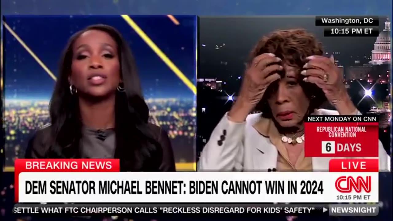 Maxine Waters fussing with her wig