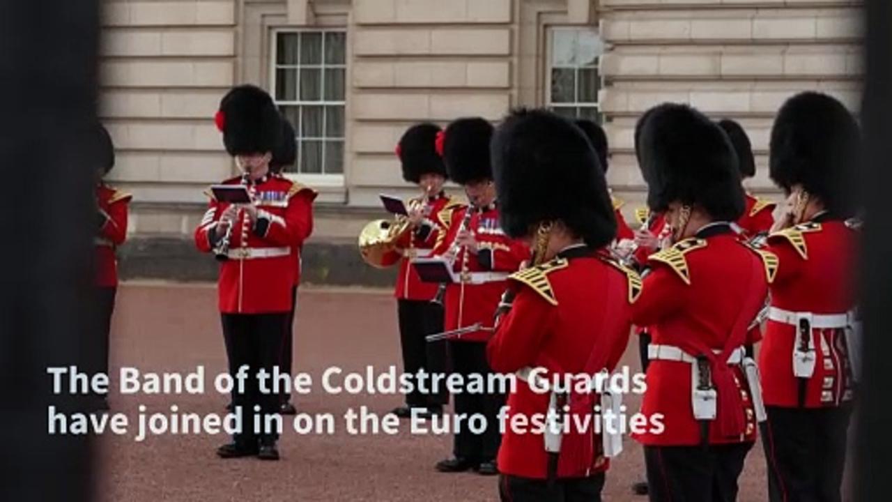 It's coming home: Guards play 'Three Lions' at Buckingham Palace