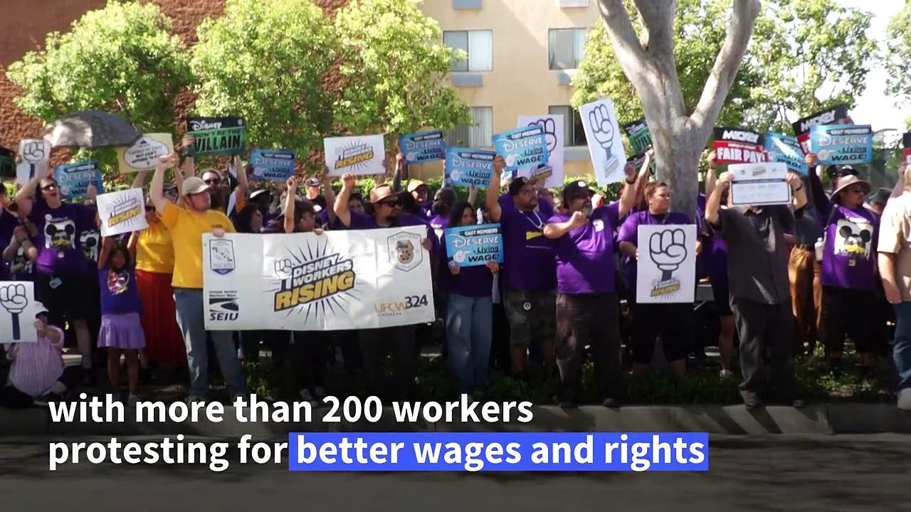 Disneyland workers threaten resort 'shut down' with strike action
