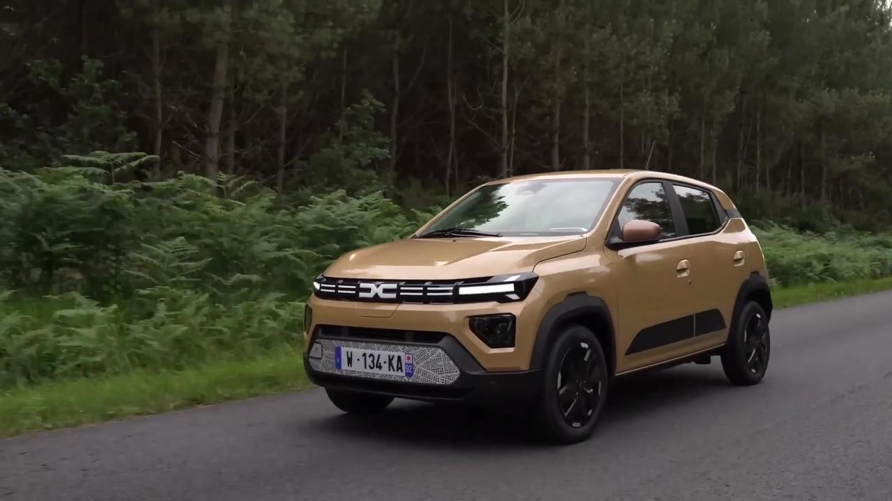 New Dacia Spring in Beige Safari Driving Video
