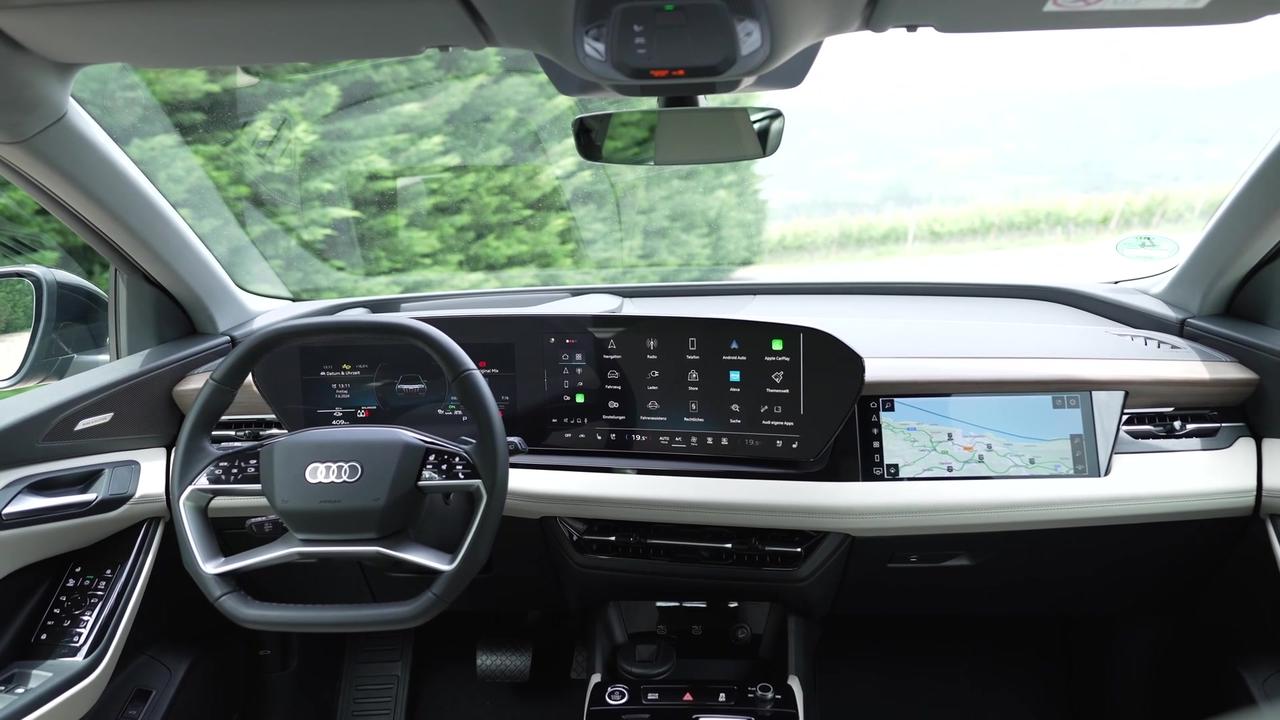 The new Audi Q6 e-tron SUV Interior Design in Plasma blue metallic