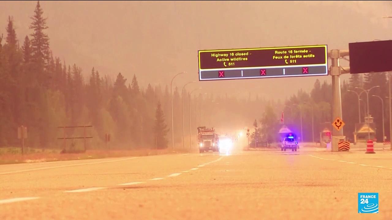 Thousands forced to evacuate as wildfire consumes Canadian town