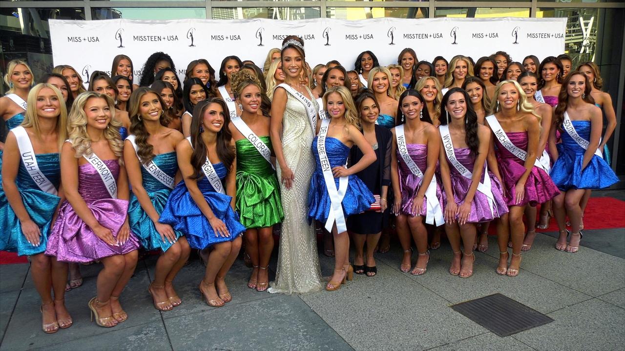 Contestants for Miss Teen USA 2024 pose on the red carpet at Peacock Theatre at L.A. Live