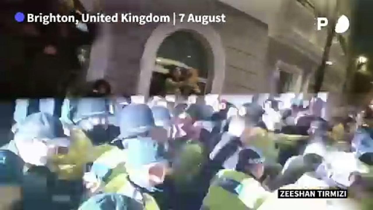 UK police escort anti-immigrant protesters away from Brighton counter-rally