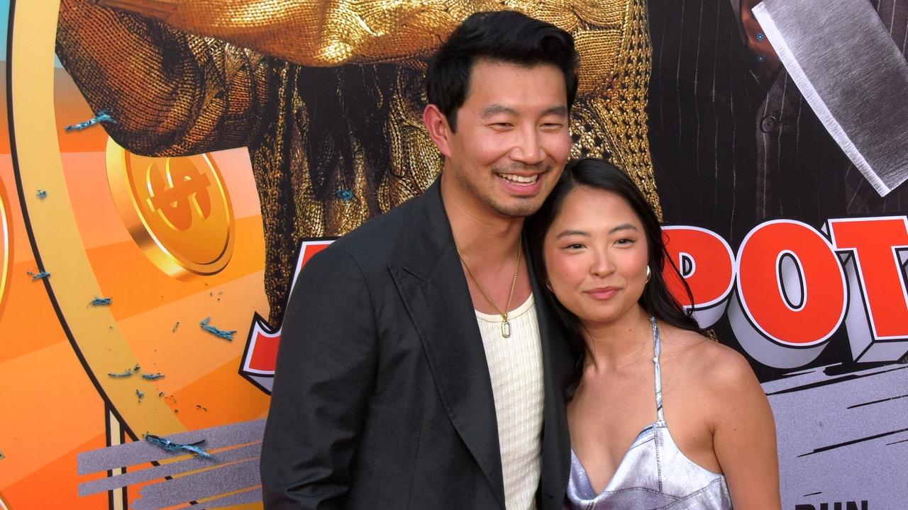 Simu Liu and Allison Hsu attend the red carpet world premiere of Jackpot!